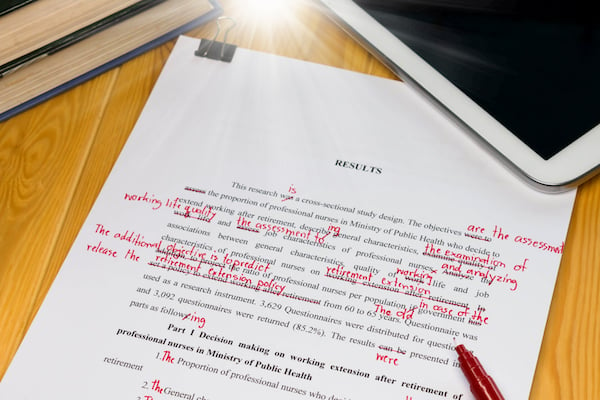 medical research document with red editor's proofreading marks