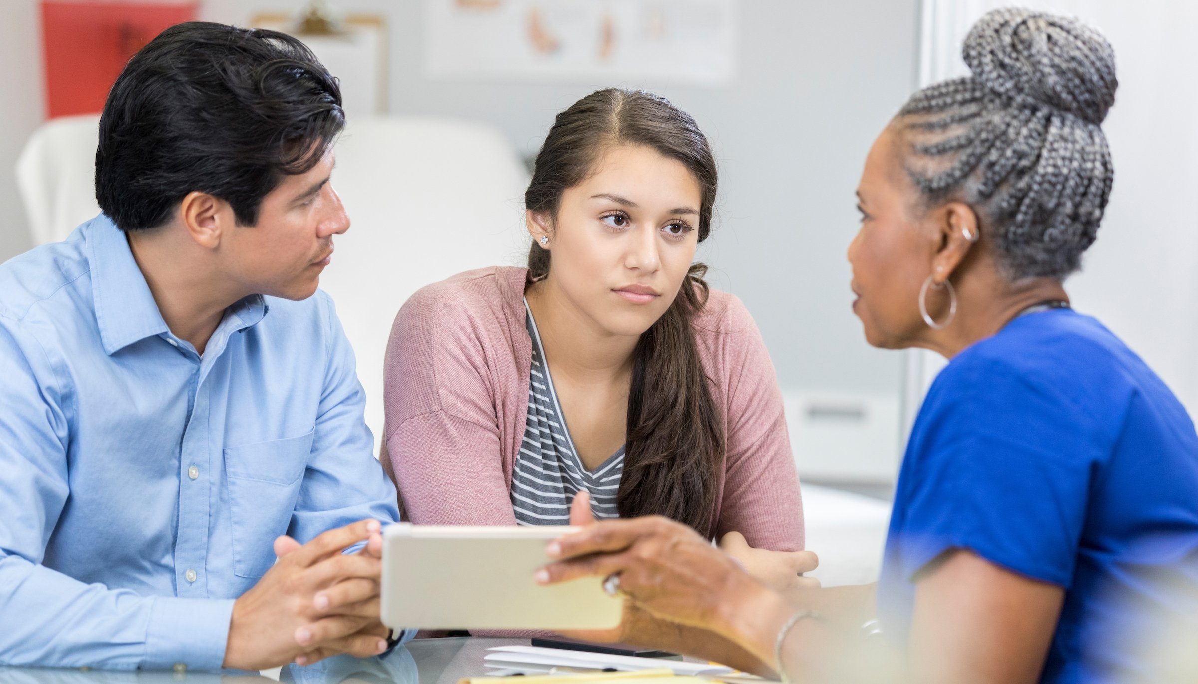 teen girl with pediatrician and uncle